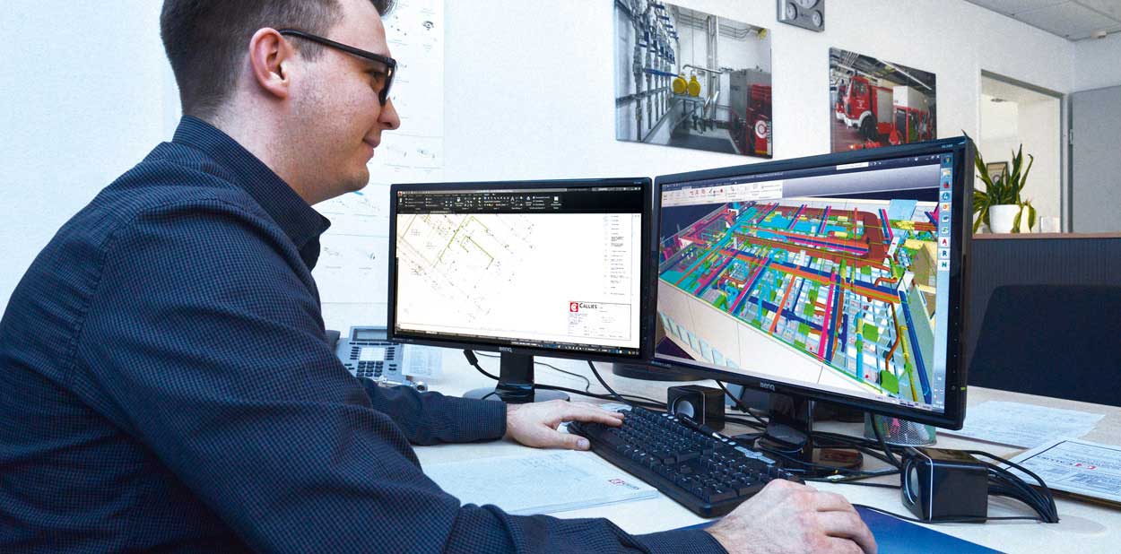 Employee is planning a concept for a fire-extinguishing system with modern computer software 